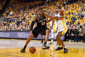 OAKLAND, CA - APRIL 24:  LaMarcus Aldridge #12 of the San Antonio Spurs handles the ball against the Golden State Warriors in Game Five of Round One of the 2018 NBA Playoffs on April 24, 2018 at ORACLE Arena in Oakland, California. NOTE TO USER: User expr