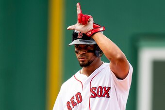 BOSTON, MA - JULY 14: Xander Bogaerts #2 of the Boston Red Sox reacts after hitting a single during the ninth inning of a game against the Toronto Blue Jays on July 14, 2018 at Fenway Park in Boston, Massachusetts. (Photo by Billie Weiss/Boston Red Sox/Ge