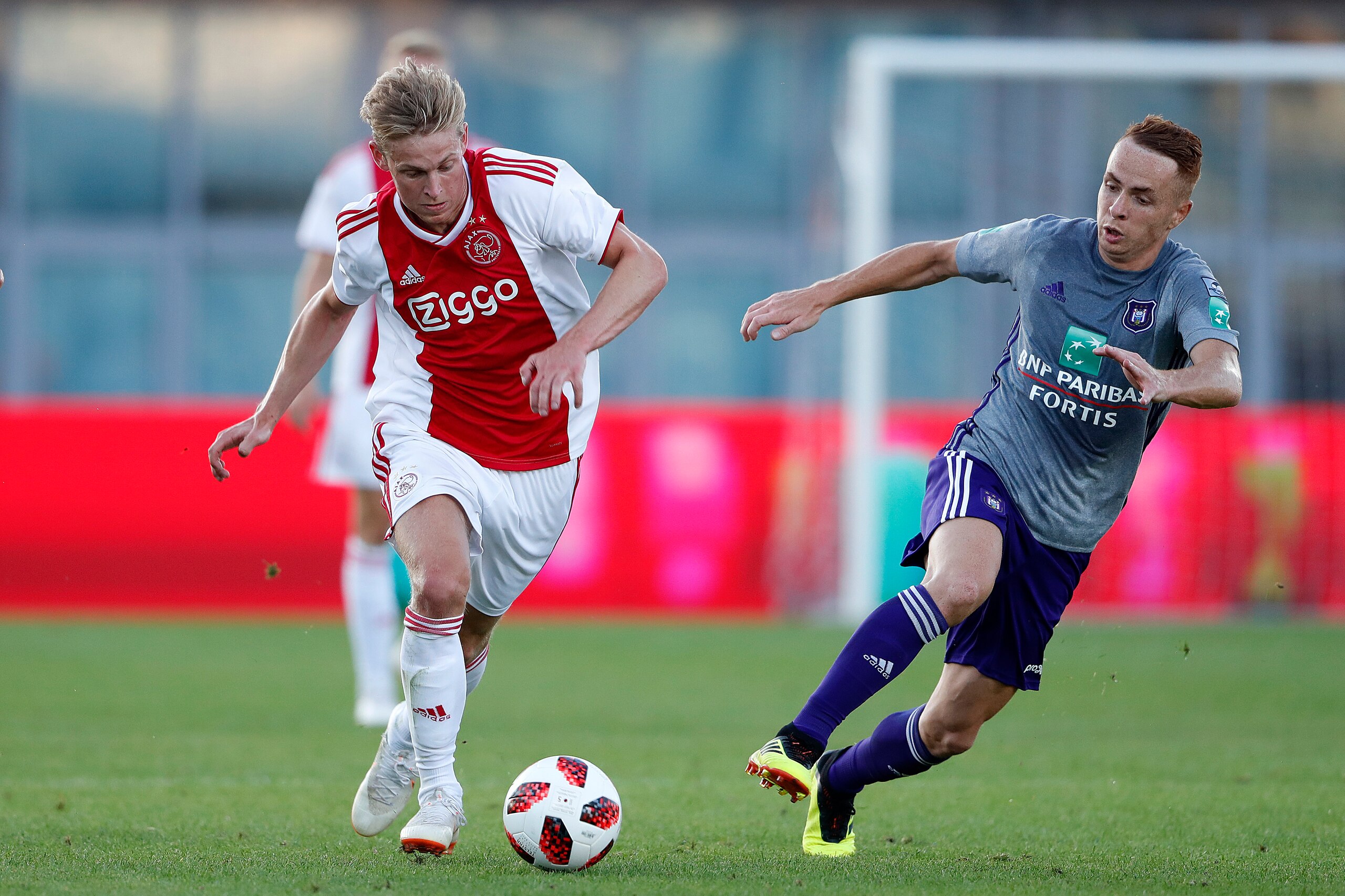 AMSTERDAM, NETHERLANDS - JULY 13: (L-R) Frenkie de Jong of Ajax, Adrien Trebel of Anderlecht  during the Club Friendly   match between Ajax v Anderlecht at the Olympisch Stadion on July 13, 2018 in Amsterdam Netherlands (Photo by Cees van Hoogdalem/Soccra