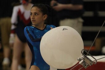 Brennan, 10, gets ready before a level 6 event.