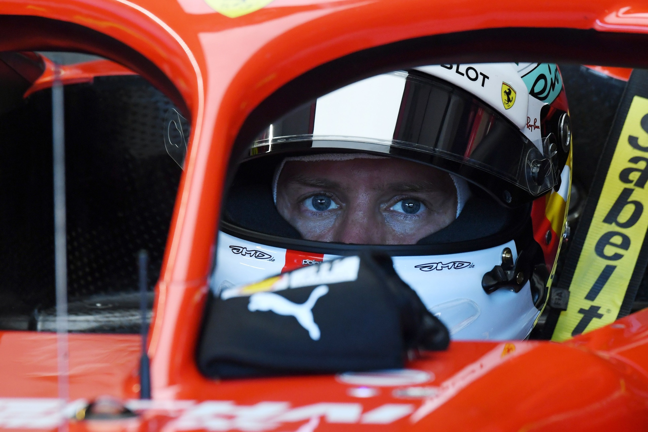 Ferrari's German driver Sebastian Vettel gets ready for the second free practice session ahead of the German Formula One Grand Prix at the Hockenheimring racing circuit on July 20, 2018 in Hockenheim, southern Germany. (Photo by Christof STACHE / AFP)    