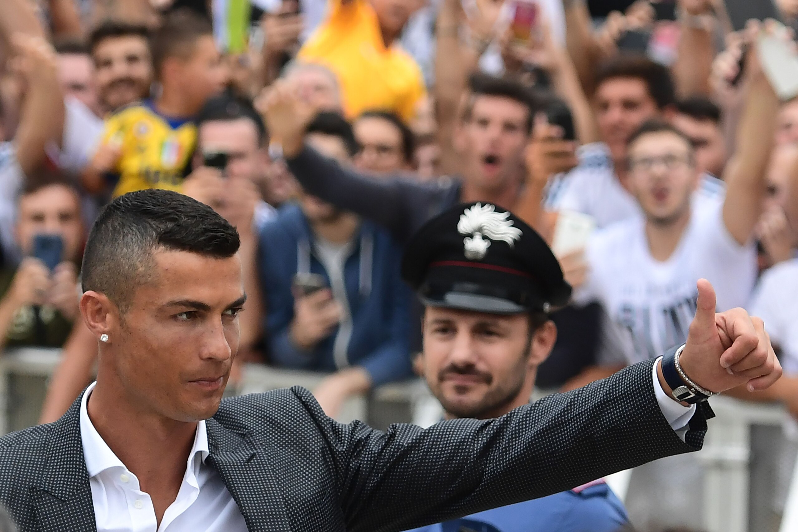 Portuguese footballer Cristiano Ronaldo arrives on July 16, 2018 at the Juventus medical centre at the Alliance stadium in Turin. Cristiano Ronaldo arrived in Turin ahead of his official unveiling as Juventus' superstar summer signing on July 17. - A Turi Portuguese footballer Cristiano Ronaldo arrives on July 16, 2018 at the Juventus medical centre at the Alliance stadium in Turin. Cristiano Ronaldo arrived in Turin ahead of his official unveiling as Juventus' superstar summer signing on July 17. - A Turi