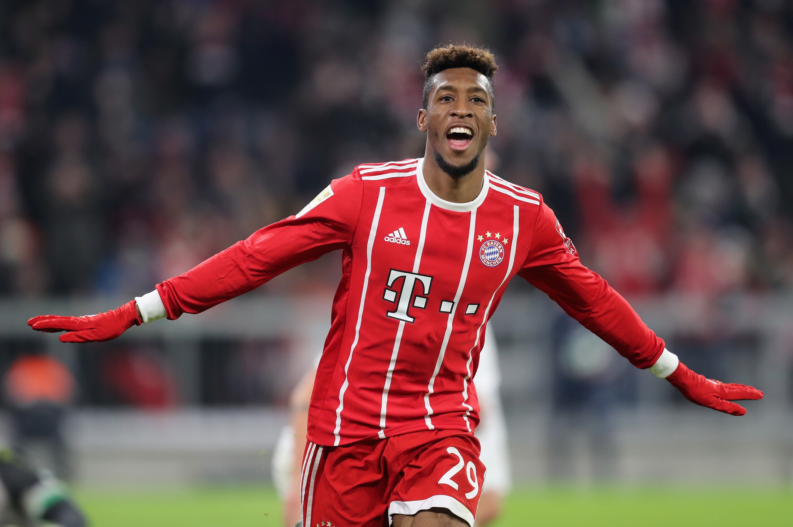 MUNICH, GERMANY - DECEMBER 02:  Kingsley Coman of FC Bayern Muenchen celebrates after scoring his team's second goal during the Bundesliga match between FC Bayern Muenchen and Hannover 96 at Allianz Arena on December 2, 2017 in Munich, Germany.  (Photo by