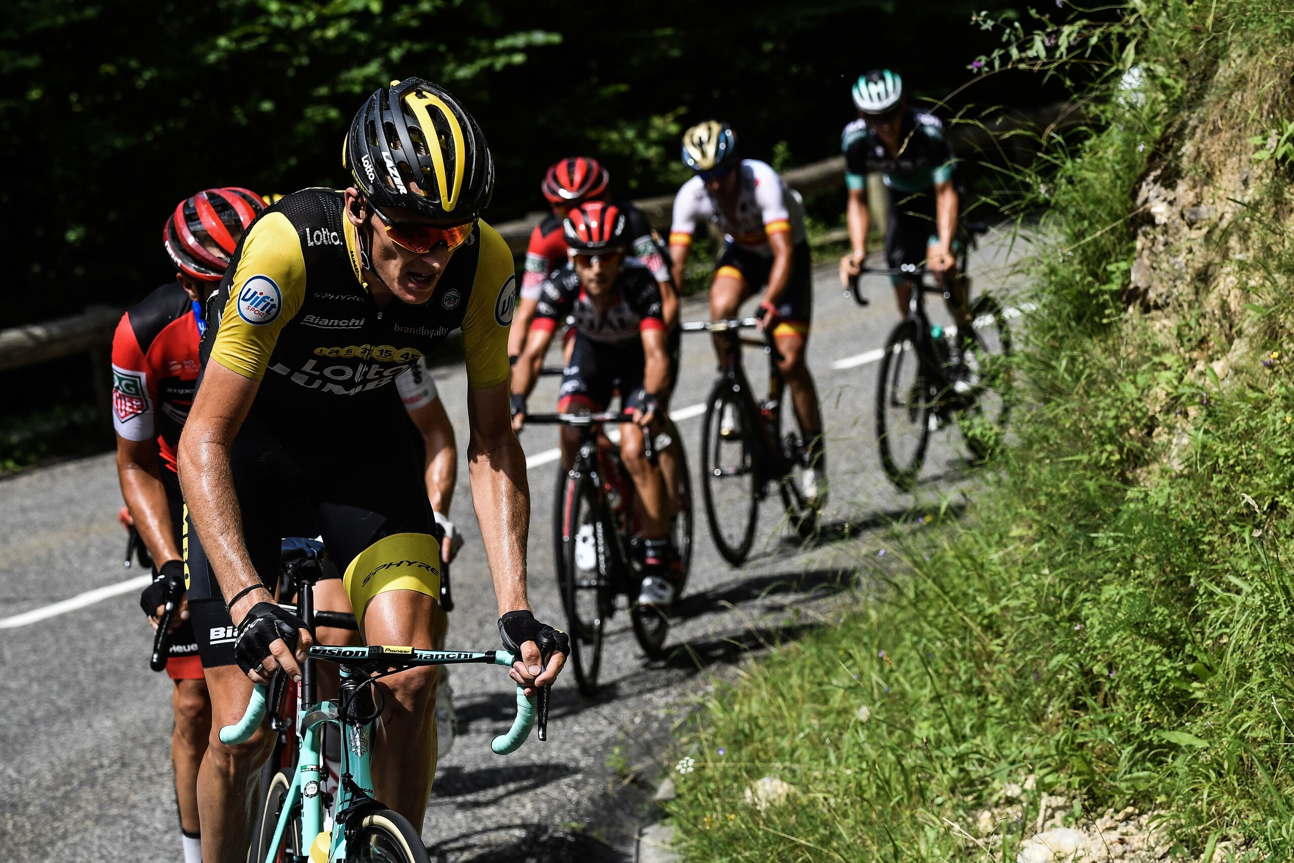 Netherlands' Robert Gesink (L) rides in a counter attack group in the ascent of the Mente pass during the 16th stage of the 105th edition of the Tour de France cycling race, between Carcassonne and Bagneres-de-Luchon, southwestern France, on July 24, 2018