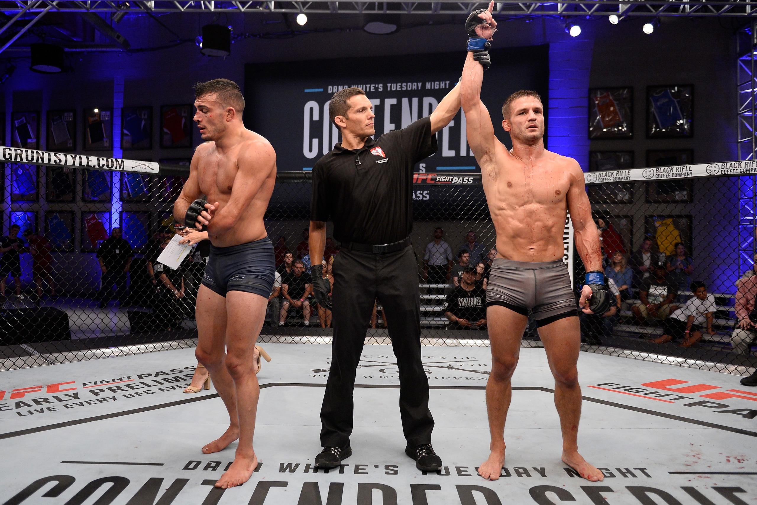LAS VEGAS, NV - JULY 24:  Alex Munoz celebrates after his decision victory over Nick Newell in their lightweight fight during Dana White's Tuesday Night Contender Series at the TUF Gym on July 24, 2018 in Las Vegas, Nevada. (Photo by Chris Unger/DWTNCS LL