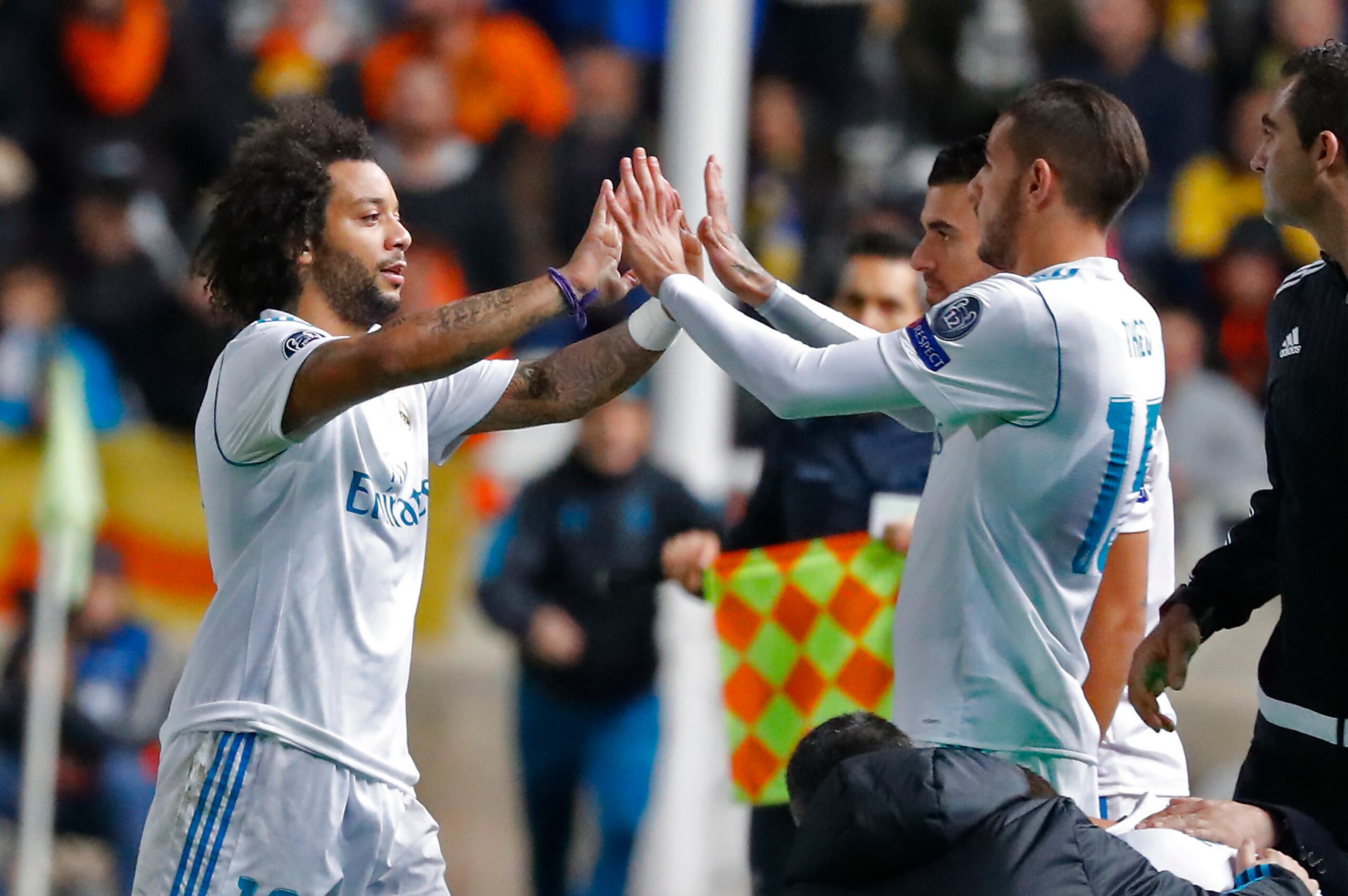 Real Madrid's Brazillian defender Marcelo celebrates with Real Madrid's French defender Theo Hernandez during the UEFA Champions League Group H match between Apoel FC and Real Madrid on November 21, 2017, in the Cypriot capital Nicosia's GSP Stadium.  / A