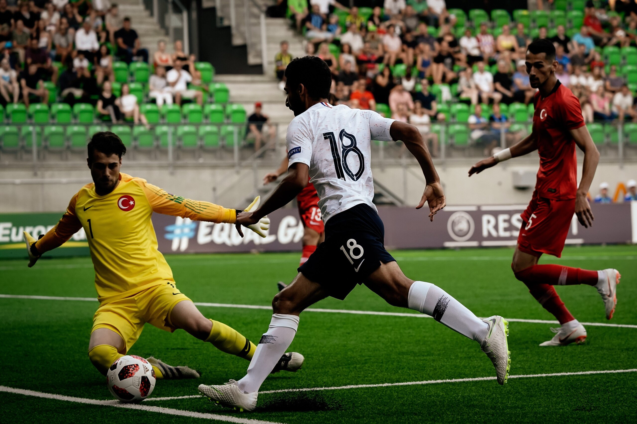 Nabil Alioui of France and Ataberk Dadakdeniz vie for the ball during the football 2018 UEFA European Under-19 Championship Group stage match Turkey vs France in Vaasa, Finland on July 20, 2018. (Photo by Samppa Toivonen / Lehtikuva / AFP) / Finland OUT  