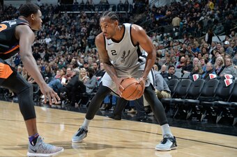 SAN ANTONIO, TX - JANUARY 5: Kawhi Leonard #2 of the San Antonio Spurs handles the ball against the Phoenix Suns on January 5, 2018 at the AT&T Center in San Antonio, Texas. NOTE TO USER: User expressly acknowledges and agrees that, by downloading and or 