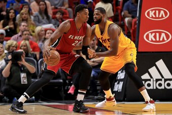 MIAMI, FL - MARCH 04: Hassan Whiteside #21 of the Miami Heat posts up Tristan Thompson #13 of the Cleveland Cavaliers during a game  at American Airlines Arena on March 4, 2017 in Miami, Florida. NOTE TO USER: User expressly acknowledges and agrees that, 