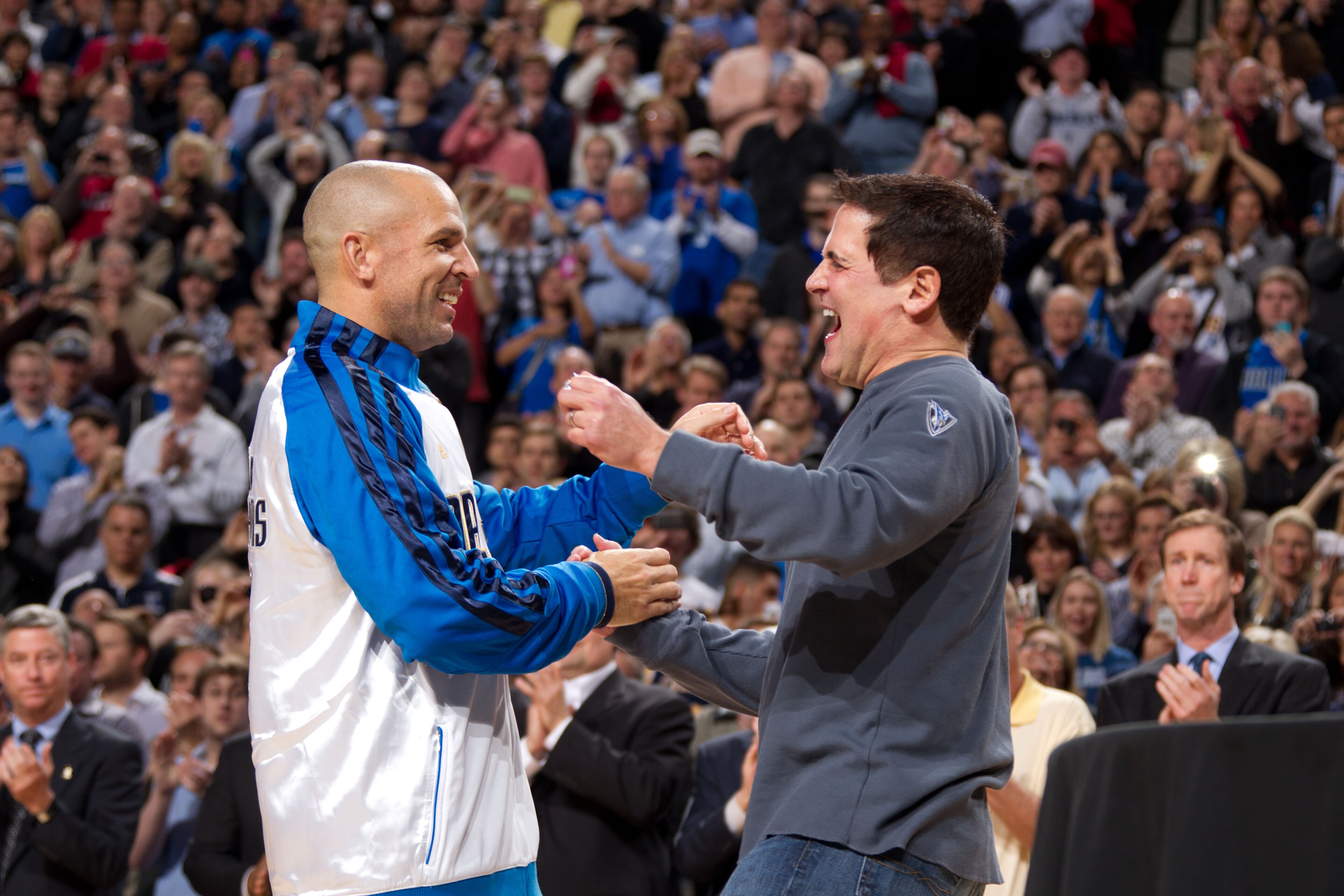 DALLAS, TX - JANUARY 25:  Jason Kidd of the Dallas Mavericks celebrates with team owner Mark Cuban as the Mavericks received their 2010-2011 NBA Championship rings prior to  during the game against the Dallas Mavericks and the Minnesota Timberwolves on Ja