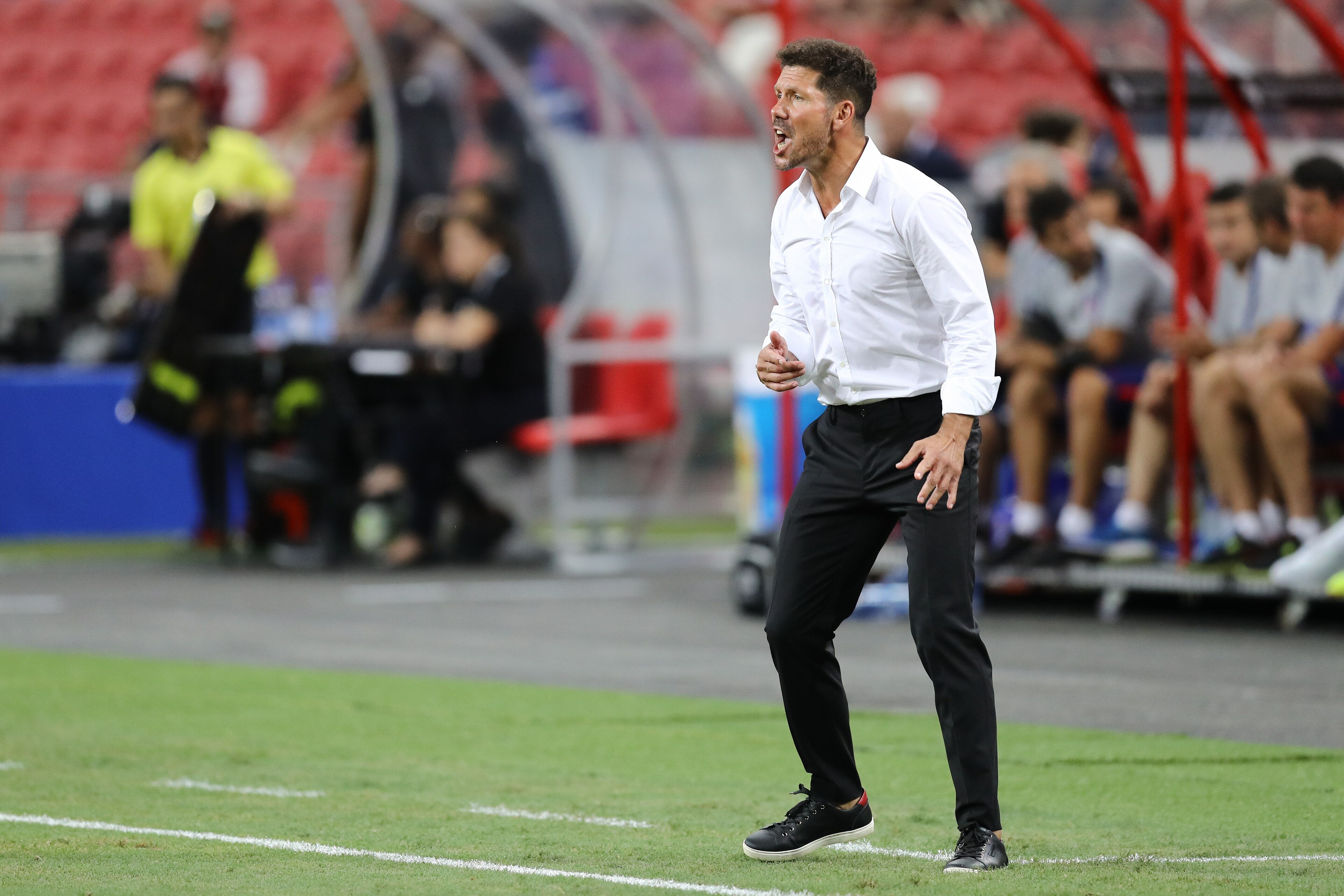 SINGAPORE, SINGAPORE - JULY 26: Diego Simeone, manager for Club Atletico de Madrid, gives instruction to his players during the International Champions Cup 2018 match between Club Atletico de Madrid and Arsenal at the National Stadium on July 26, 2018 in 