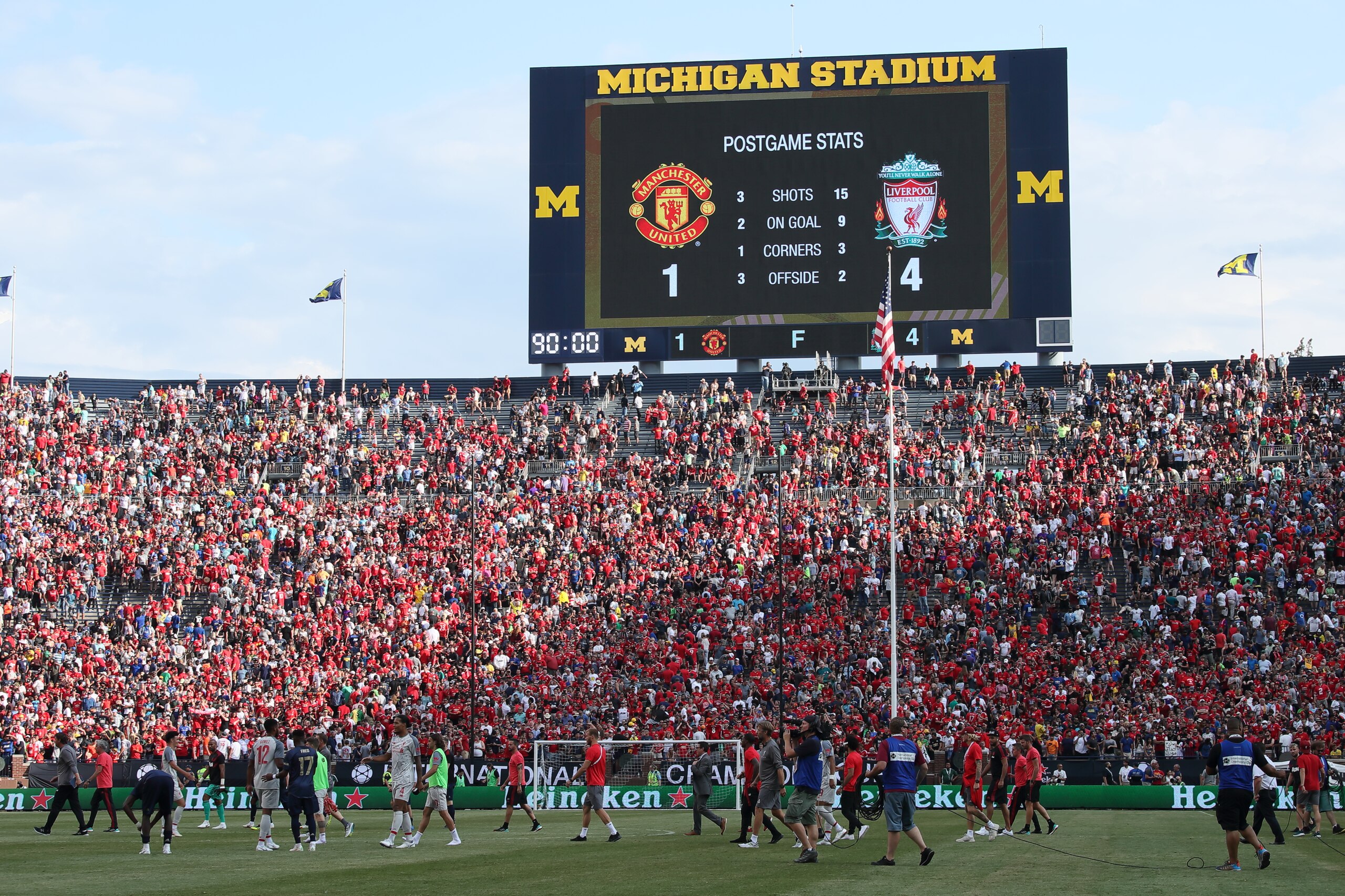 ANN ARBOR, MI - JULY 28: The two teams leave the field with the stadium scoreboard showing the final score of Manchester United 1 - 4 Liverpool in the International Champions Cup 2018 match between Manchester Untied and Liverpool at Michigan Stadium on Ju
