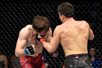 CALGARY, AB - JULY 28:  (R-L) Alexander Hernandez punches Olivier Aubin-Mercier of Canada in their lightweight bout during the UFC Fight Night event at Scotiabank Saddledome on July 28, 2018 in Calgary, Alberta, Canada. (Photo by Jeff Bottari/Zuffa LLC/Zu