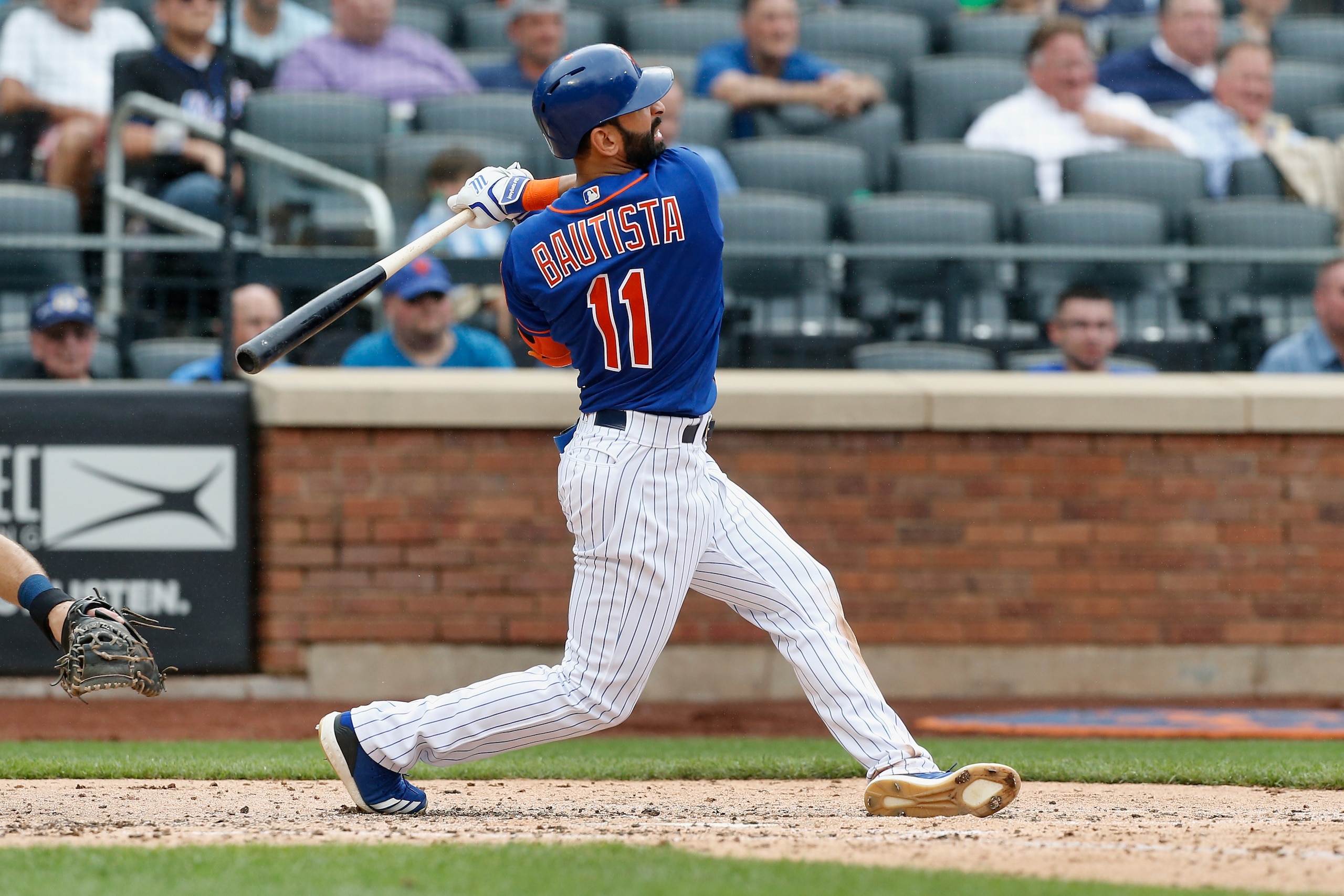 NEW YORK, NY - JULY 25:  Jose Bautista #11 of the New York Mets follows through on his sixth inning two run home run against the San Diego Padres at Citi Field on July 25, 2018 in the Flushing neighborhood of the Queens borough of New York City.  (Photo b