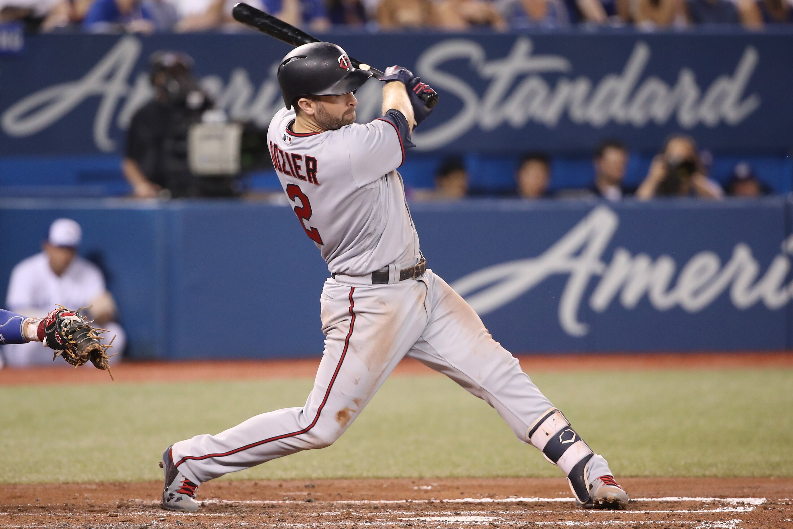 TORONTO, ON - JULY 24: Brian Dozier #2 of the Minnesota Twins hits a single in the fourth inning during MLB game action against the Toronto Blue Jays at Rogers Centre on July 24, 2018 in Toronto, Canada. (Photo by Tom Szczerbowski/Getty Images)