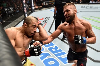 CALGARY, AB - JULY 28:  (R-L) Jeremy Stephens punches Jose Aldo of Brazil in their featherweight bout during the UFC Fight Night event at Scotiabank Saddledome on July 28, 2018 in Calgary, Alberta, Canada. (Photo by Jeff Bottari/Zuffa LLC/Zuffa LLC via Ge