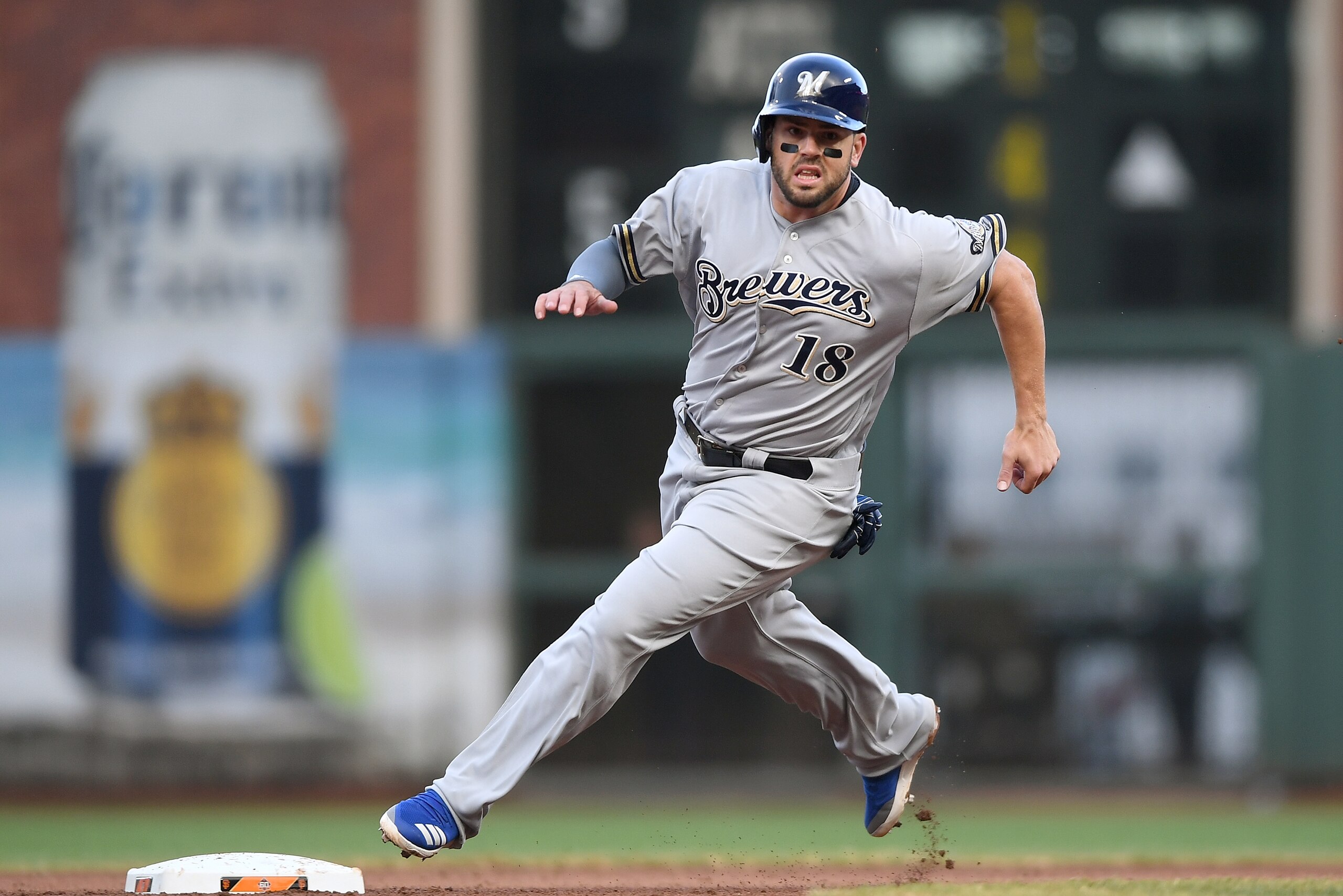SAN FRANCISCO, CA - JULY 28:  Mike Moustakas #18 of the Milwaukee Brewers runs the bases against the San Francisco Giants in the top of the fifth inning at AT&T Park on July 28, 2018 in San Francisco, California.  (Photo by Thearon W. Henderson/Getty Imag