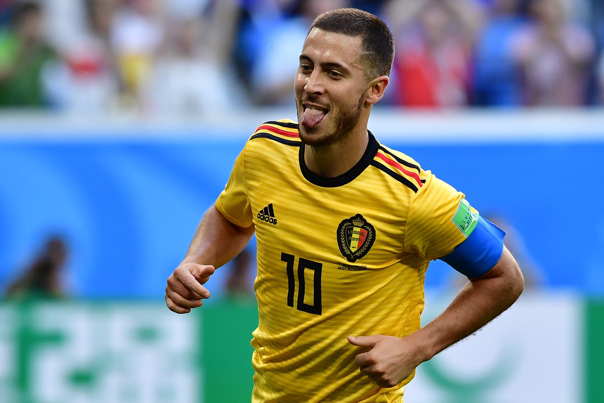TOPSHOT - Belgium's forward Eden Hazard sticks his tongue out as he celebrates after scoring their second goal during their Russia 2018 World Cup play-off for third place football match between Belgium and England at the Saint Petersburg Stadium in Saint 
