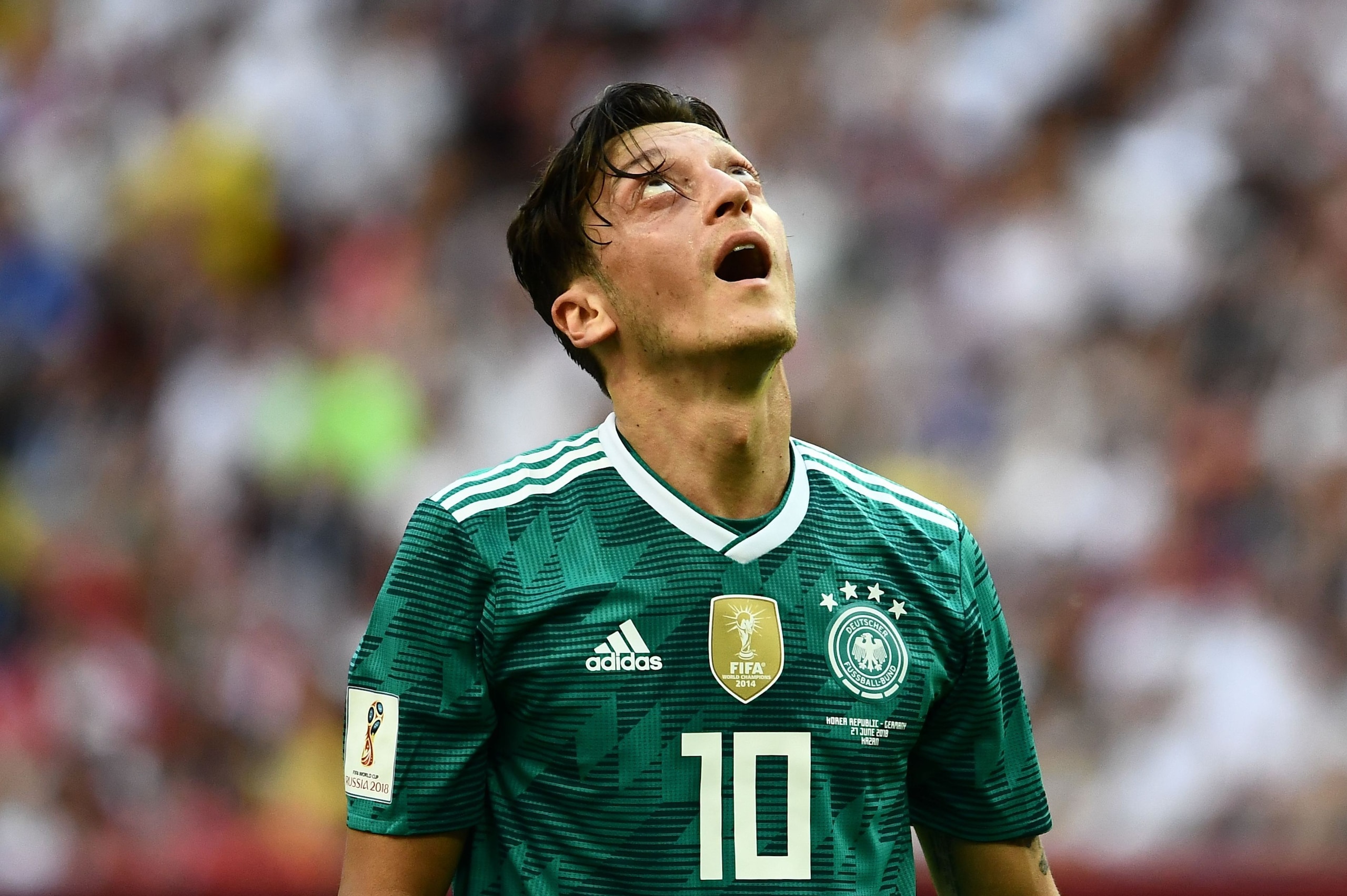 TOPSHOT - Germany's midfielder Mesut Ozil reacts during the Russia 2018 World Cup Group F football match between South Korea and Germany at the Kazan Arena in Kazan on June 27, 2018. (Photo by Jewel SAMAD / AFP) / RESTRICTED TO EDITORIAL USE - NO MOBILE P
