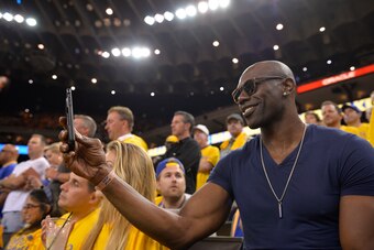 OAKLAND, CA - JUNE 3: NFL Hall of Famer Terrell Owens takes in the game of the Cleveland Cavaliers against the Golden State Warriors during Game Two of the 2018 NBA Finals on June 3, 2018 at ORACLE Arena in Oakland, California. NOTE TO USER: User expressl