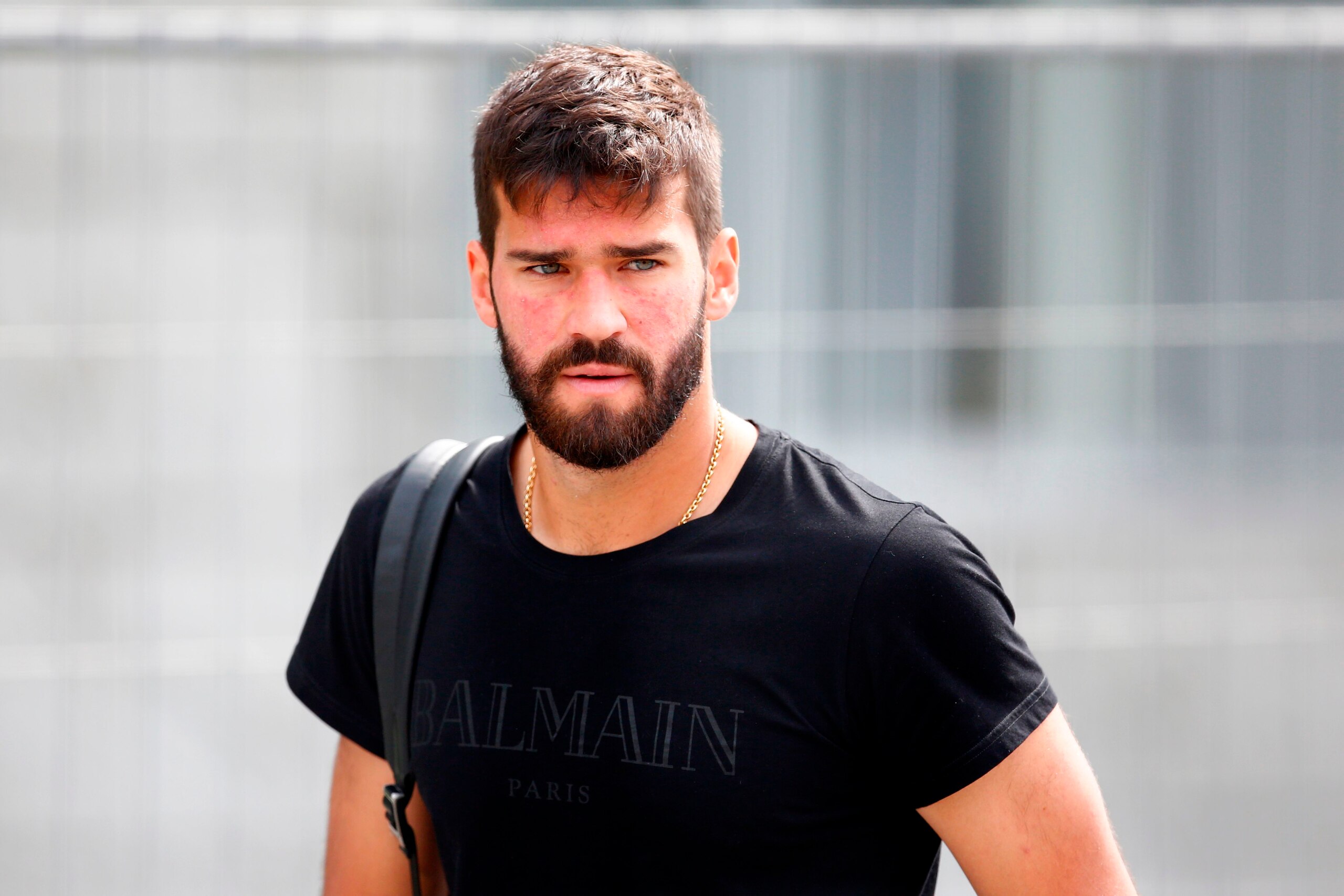 Brazil's goalkeeper Alisson leaves his team's hotel in Kazan on July 7, 2018, a day after the five-time champions crashed out of the Russia 2018 World Cup football tournament after a 2-1 quarter-final defeat to Belgium. (Photo by Benjamin CREMEL / AFP) Brazil's goalkeeper Alisson leaves his team's hotel in Kazan on July 7, 2018, a day after the five-time champions crashed out of the Russia 2018 World Cup football tournament after a 2-1 quarter-final defeat to Belgium. (Photo by Benjamin CREMEL / AFP)