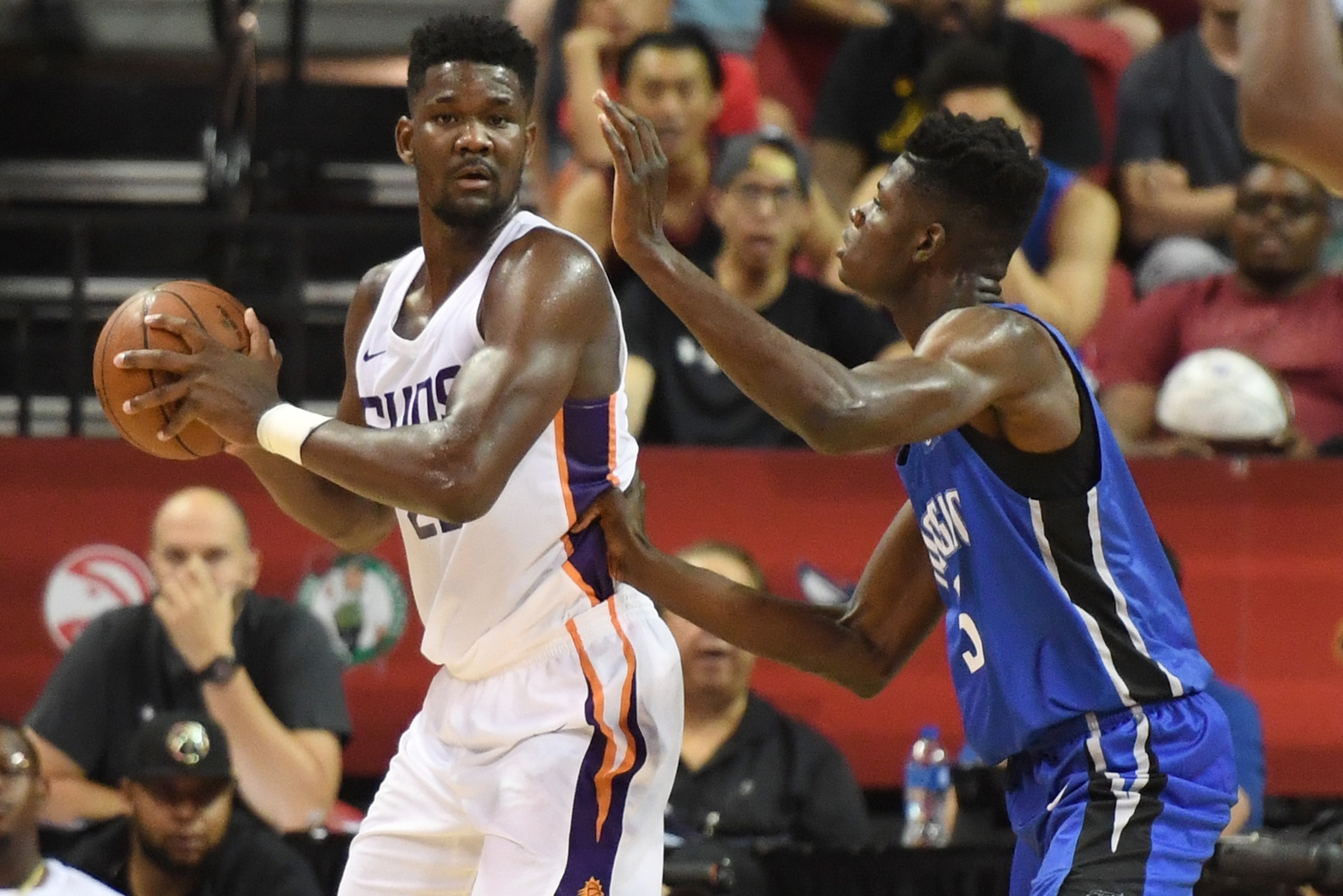 LAS VEGAS, NV - JULY 09: Deandre Ayton #22 of the Phoenix Suns is guarded by Mohamed Bamba #5 of the Orlando Magic during the 2018 NBA Summer League at the Thomas & Mack Center on July 9, 2018 in Las Vegas, Nevada. The Suns defeated the Magic 71-53. NOTE LAS VEGAS, NV - JULY 09: Deandre Ayton #22 of the Phoenix Suns is guarded by Mohamed Bamba #5 of the Orlando Magic during the 2018 NBA Summer League at the Thomas & Mack Center on July 9, 2018 in Las Vegas, Nevada. The Suns defeated the Magic 71-53. NOTE
