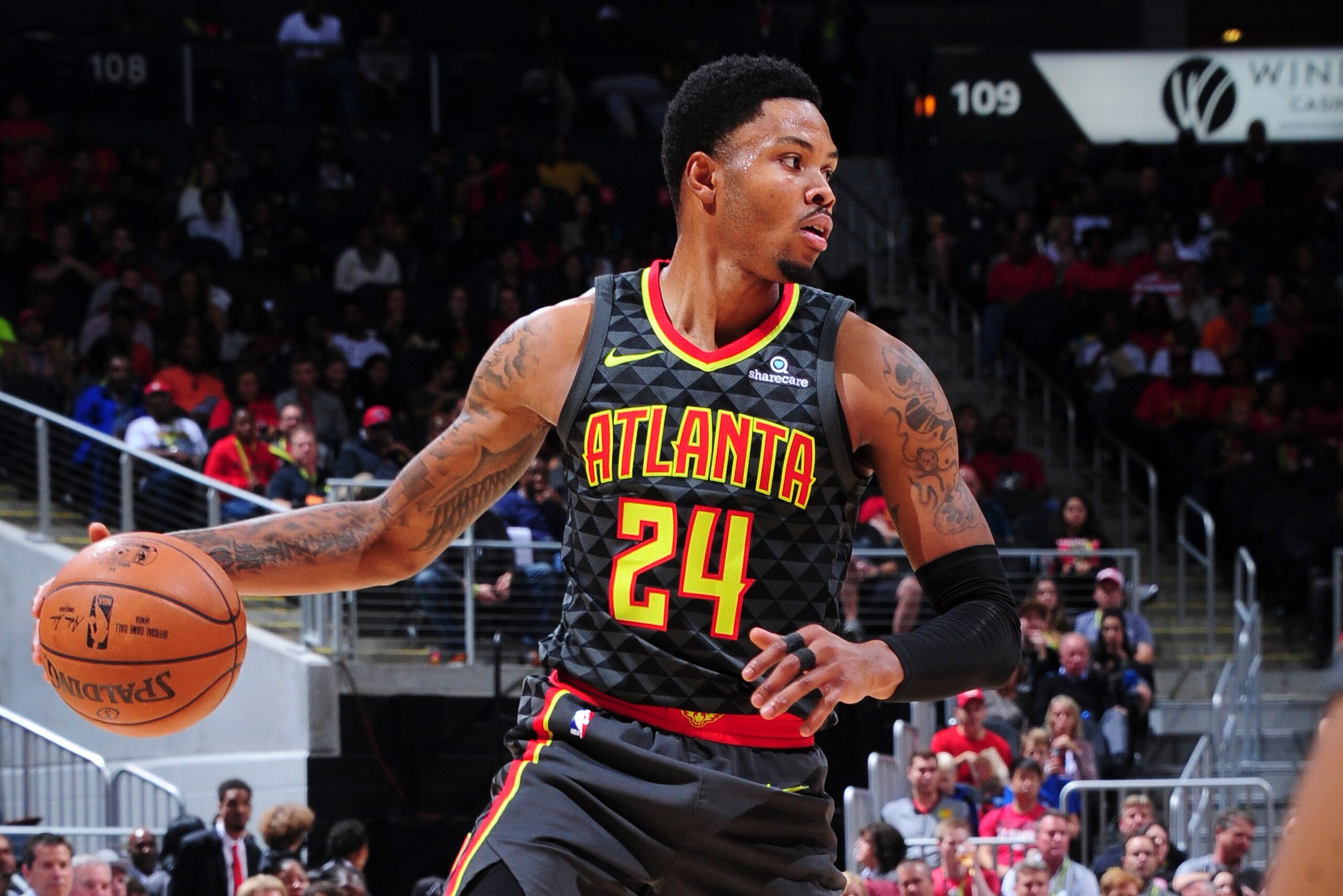 ATLANTA, GA - NOVEMBER 3: Kent Bazemore #24 of the Atlanta Hawks handles the ball against the Houston Rockets on November 3, 2017 at Philips Arena in Atlanta, Georgia.  NOTE TO USER: User expressly acknowledges and agrees that, by downloading and/or using