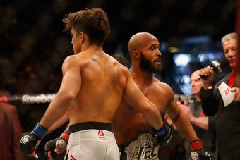 LAS VEGAS, NV - APRIL 23:  (L-R) Henry Cejudo and Demetrious Johnson embrase after their flyweight championship bout during the UFC 197 event inside MGM Grand Garden Arena on April 23, 2016 in Las Vegas, Nevada.  (Photo by Christian Petersen/Zuffa LLC/Zuf
