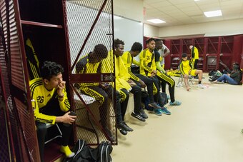 The Generals hang in the locker room before taking the field.