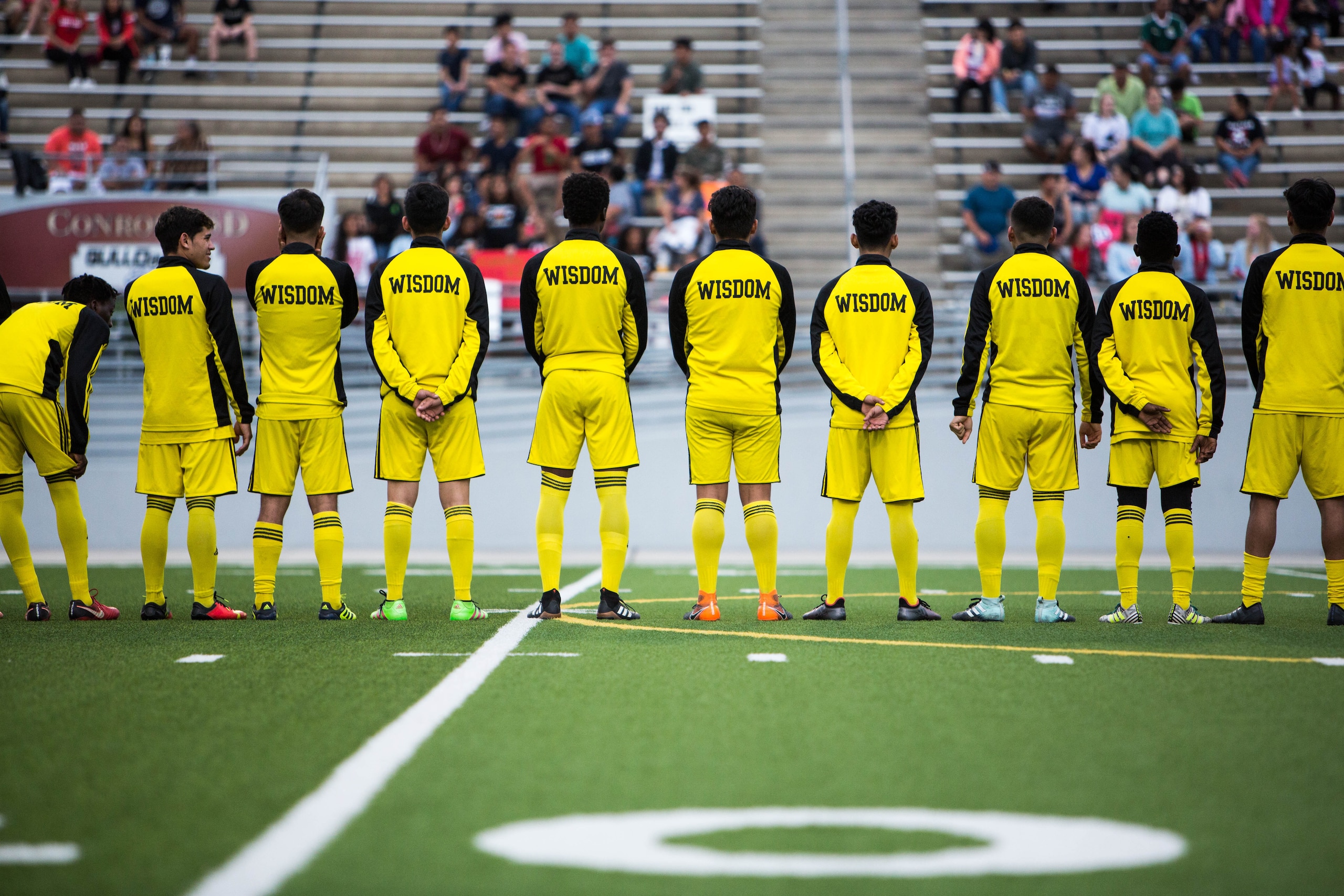 The 28-man Wisdom High School boys roster is made up of immigrants from 13 countries and four continents.