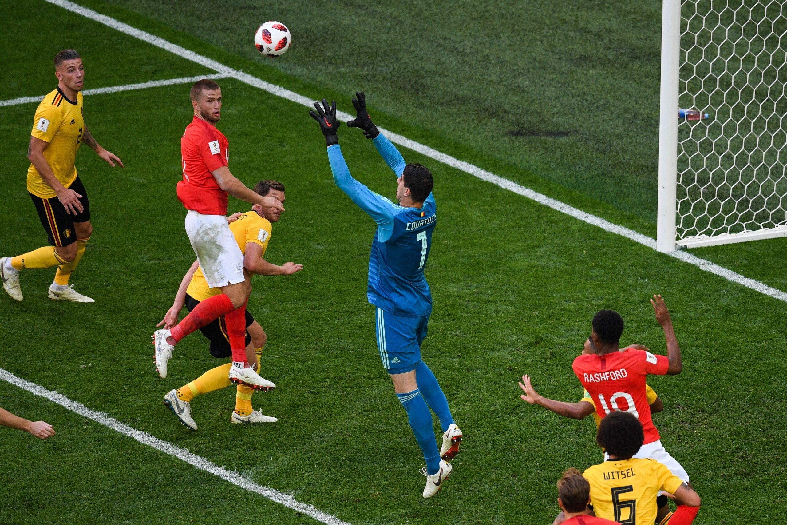Belgium's goalkeeper Thibaut Courtois (C) jumps to make a save during their Russia 2018 World Cup play-off for third place football match between Belgium and England at the Saint Petersburg Stadium in Saint Petersburg on July 14, 2018. (Photo by OLGA MALT