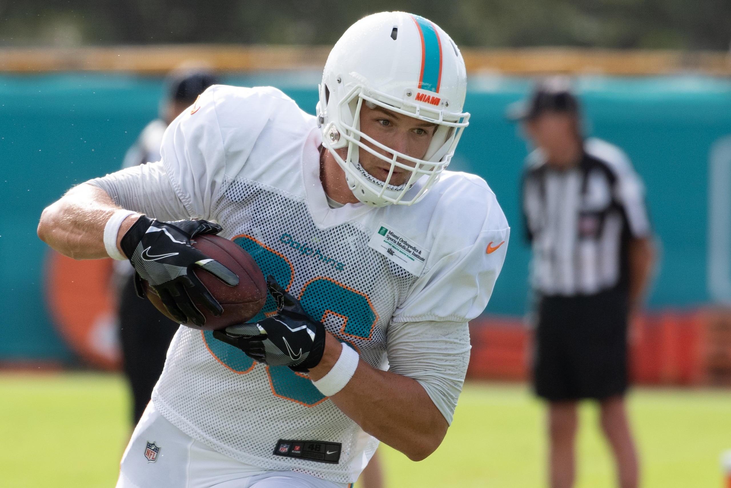 DAVIE, FL - AUGUST 2: Mike Gesicki #86 of the Miami Dolphins makes a catch during drills at Miami Dolphins Training Camp at Baptist Health Training Facility at Nova Southeastern University on August 2, 2018 in Davie, Florida. (Photo by Mark Brown/Getty Im DAVIE, FL - AUGUST 2: Mike Gesicki #86 of the Miami Dolphins makes a catch during drills at Miami Dolphins Training Camp at Baptist Health Training Facility at Nova Southeastern University on August 2, 2018 in Davie, Florida. (Photo by Mark Brown/Getty Im