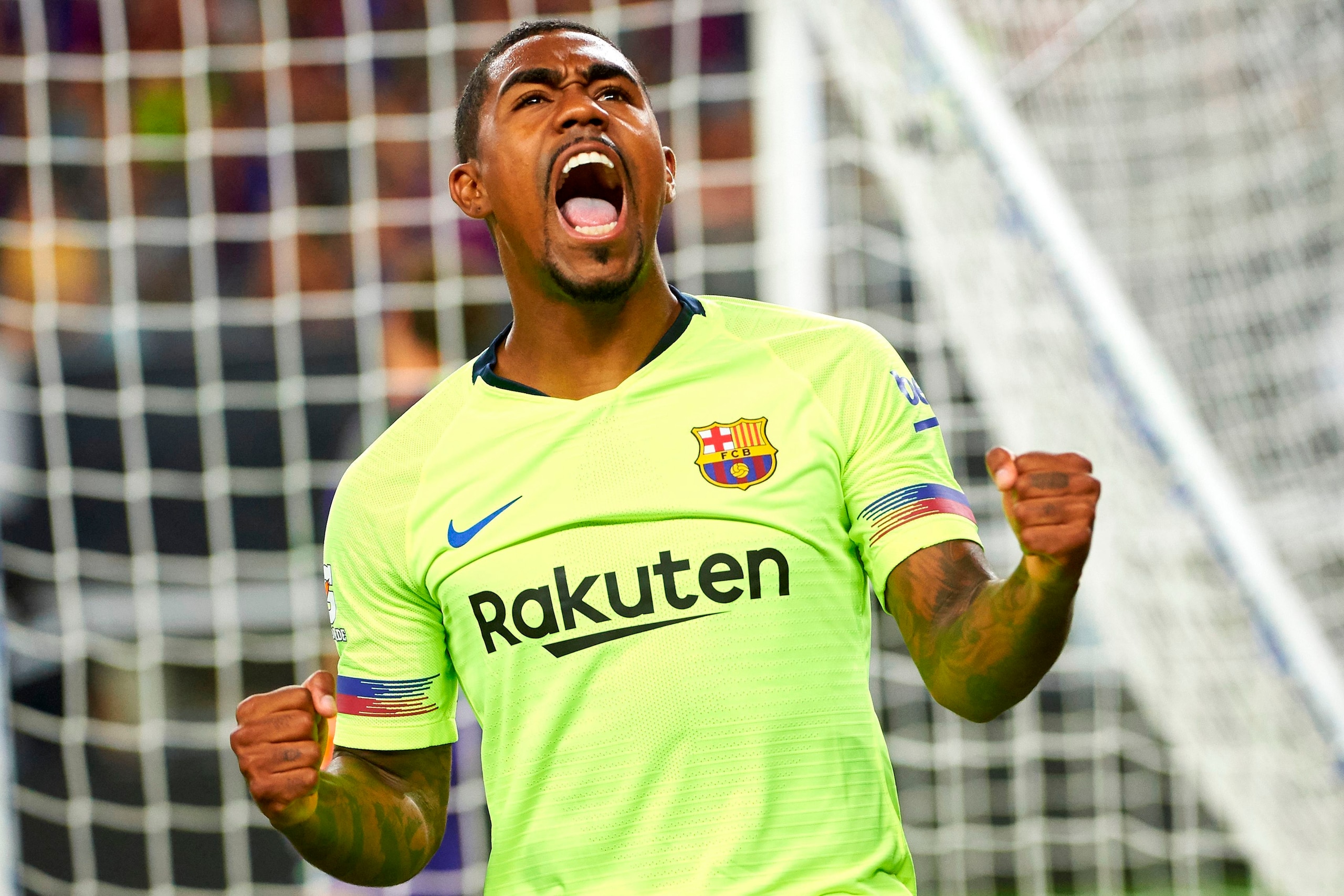 FC Barcelona's Malcom Silva celebrates after scoring a goal during the International Champions Cup (ICC) friendly football match between AS Roma and FC Barcelona on July 31, 2018 at AT&T Stadium in Arlington, Texas. (Photo by Cooper NEILL / AFP) (P FC Barcelona's Malcom Silva celebrates after scoring a goal during the International Champions Cup (ICC) friendly football match between AS Roma and FC Barcelona on July 31, 2018 at AT&T Stadium in Arlington, Texas. (Photo by Cooper NEILL / AFP) (P
