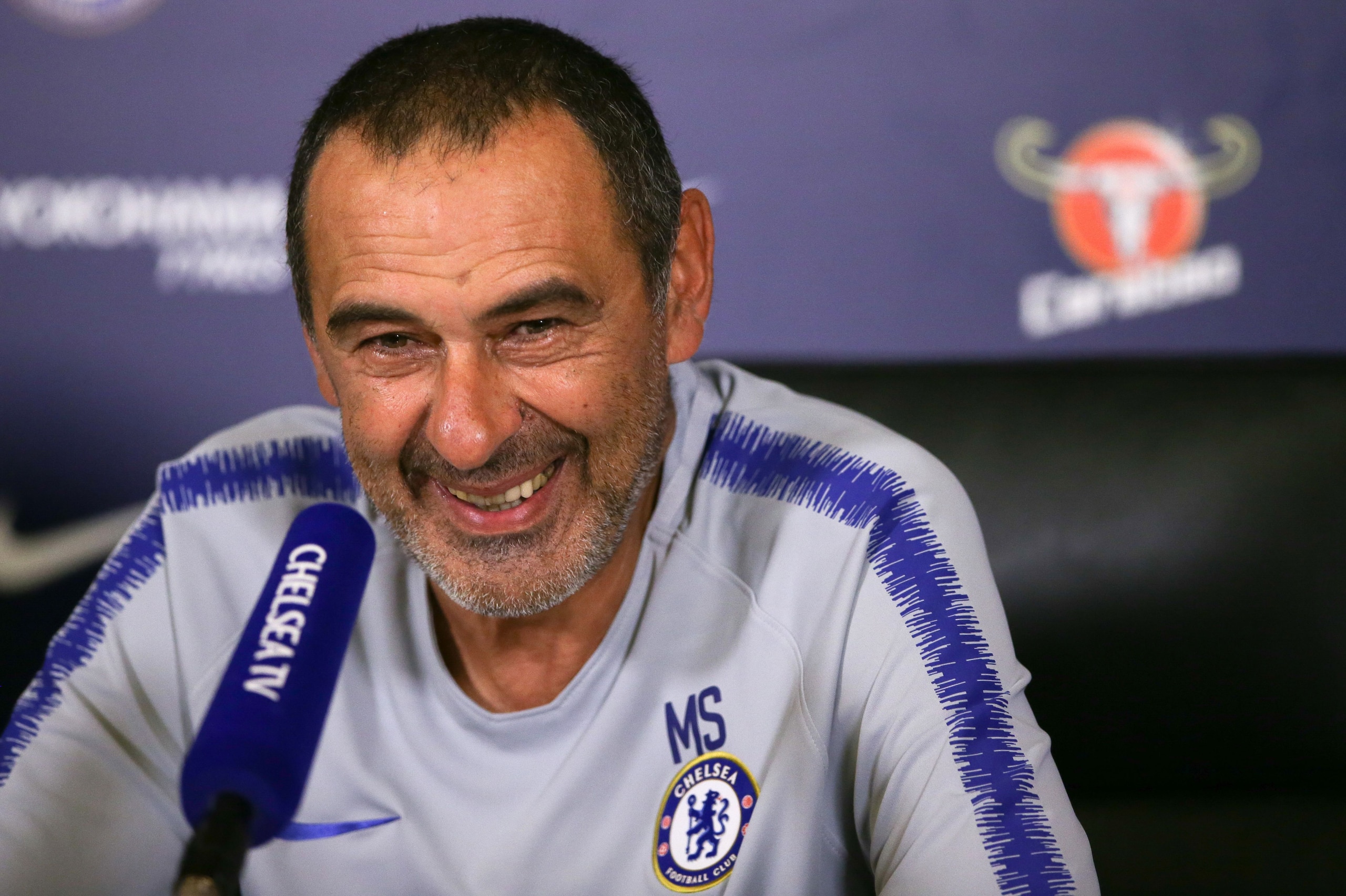 Chelsea's Italian manager Maurizio Sarri gestures during a press conference at Chelsea FC Cobham Training Ground in Stoke D'Abernon, southwest of London on August 3, 2018, prior to their FA Community Shield match against Manchester City on August 5. (Phot
