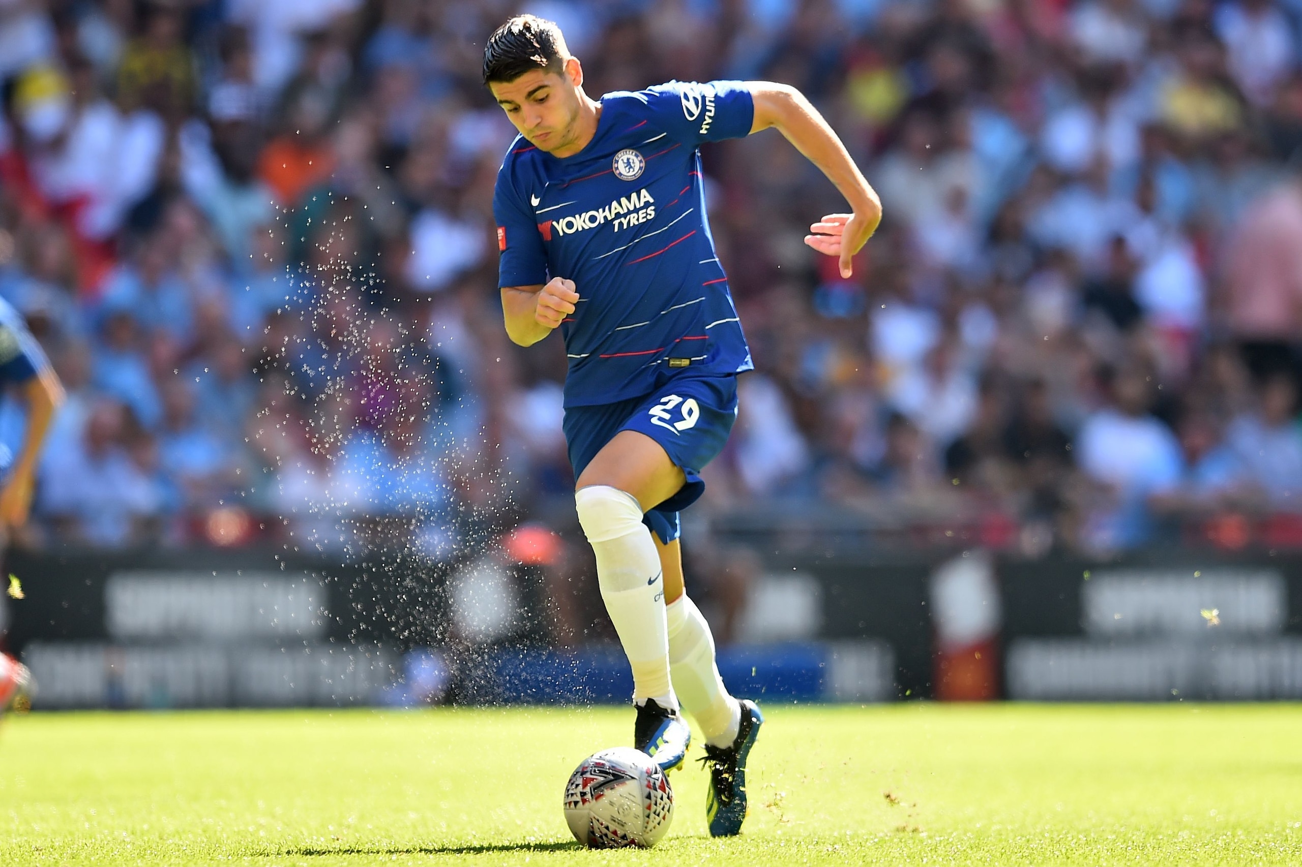 Chelsea's Spanish striker Alvaro Morata runs with the ball during the English FA Community Shield football match between Chelsea and Manchester City at Wembley Stadium in north London on August 5, 2018. (Photo by Glyn KIRK / AFP) / NOT FOR MARKETING OR AD