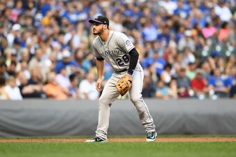 MILWAUKEE, WI - AUGUST 03:  Nolan Arenado #28 of the Colorado Rockies anticipates a pitch during a game against the Milwaukee Brewers at Miller Park on August 3, 2018 in Milwaukee, Wisconsin.  The Brewers defeated the Rockies 5-3.  (Photo by Stacy Revere/