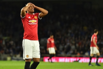 Manchester United's French striker Anthony Martial reacts after missing a chance during the English Premier League football match between Brighton and Hove Albion and Manchester United at the American Express Community Stadium in Brighton, southern Englan