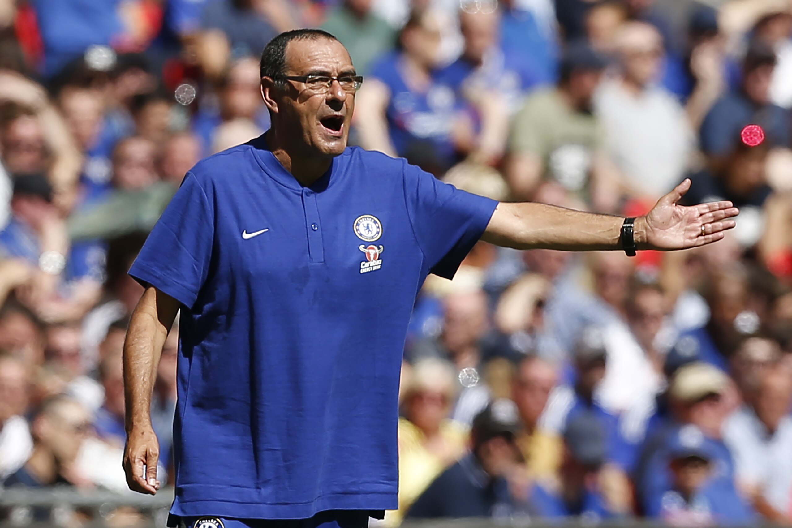 Chelsea's Italian head coach Maurizio Sarri gestures from the touchline during the English FA Community Shield football match between Chelsea and Manchester City at Wembley Stadium in north London on August 5, 2018. (Photo by Ian KINGTON / AFP) / NOT FOR Chelsea's Italian head coach Maurizio Sarri gestures from the touchline during the English FA Community Shield football match between Chelsea and Manchester City at Wembley Stadium in north London on August 5, 2018. (Photo by Ian KINGTON / AFP) / NOT FOR