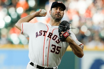 Justin Verlander pitches in the first inning against the Texas Rangers at Minute Maid Park on July 28, 2018 in Houston, Texas.