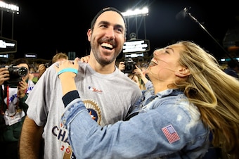LOS ANGELES, CA - NOVEMBER 01:  Justin Verlander #35 of the Houston Astros celebrates with fiancee Kate Upton after the Astros defeated the Los Angeles Dodgers 5-1 in game seven to win the 2017 World Series at Dodger Stadium on November 1, 2017 in Los Ang