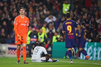 BARCELONA, SPAIN - MARCH 14: A dejected Thibaut Courtois of Chelsea after Lionel Messi of FC Barcelona scored a goal to make it 3-0 during the UEFA Champions League Round of 16 Second Leg match FC Barcelona and Chelsea FC at Camp Nou on March 14, 2018 in 