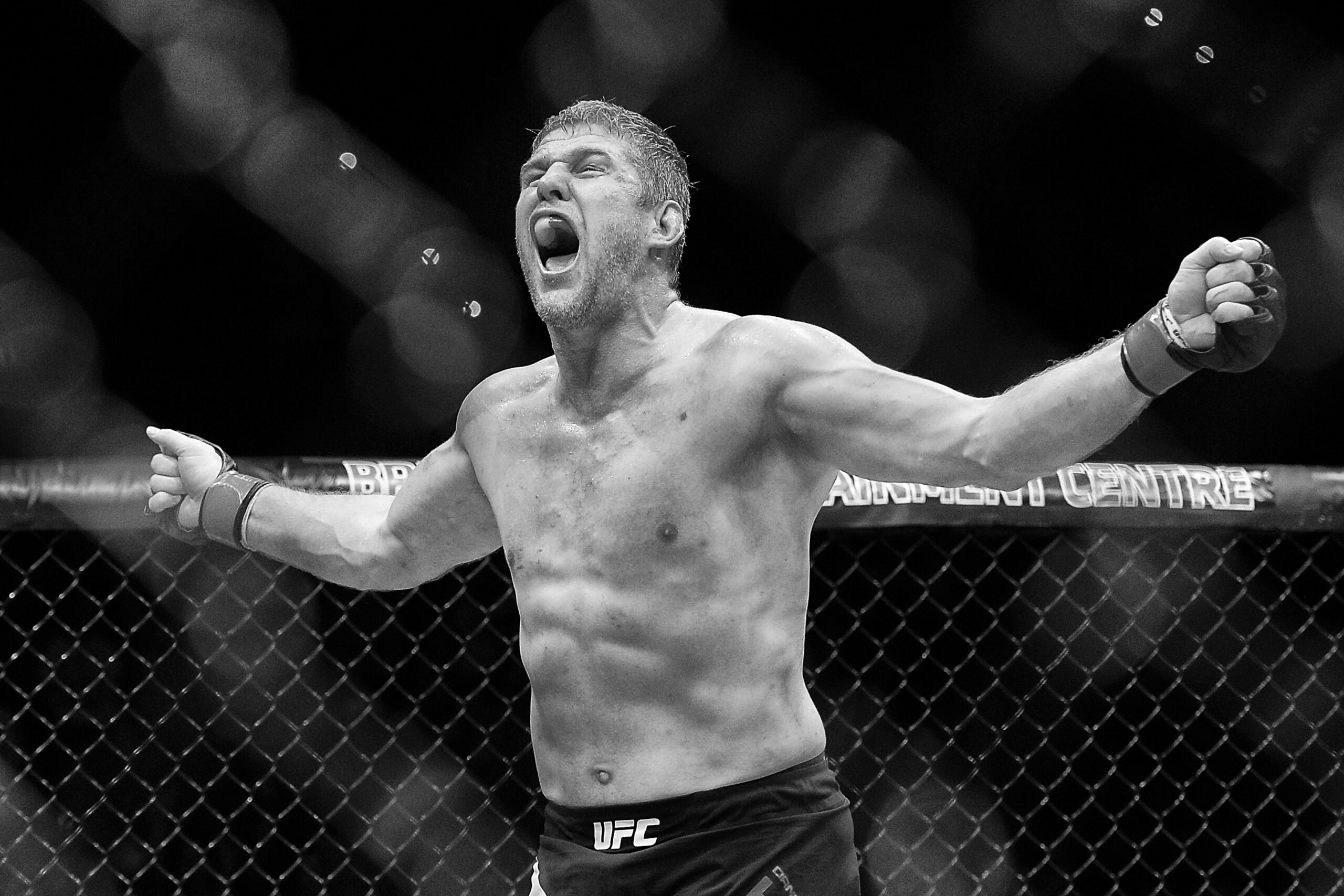 BRISBANE, AUSTRALIA - MARCH 20:  (Editors note: Image has been converted to black and white.) Daniel Kelly celebrates his victory against Antonio Carlos Junior after their UFC Middleweight Bout at UFC Brisbane on March 20, 2016 in Brisbane, Australia.  (P