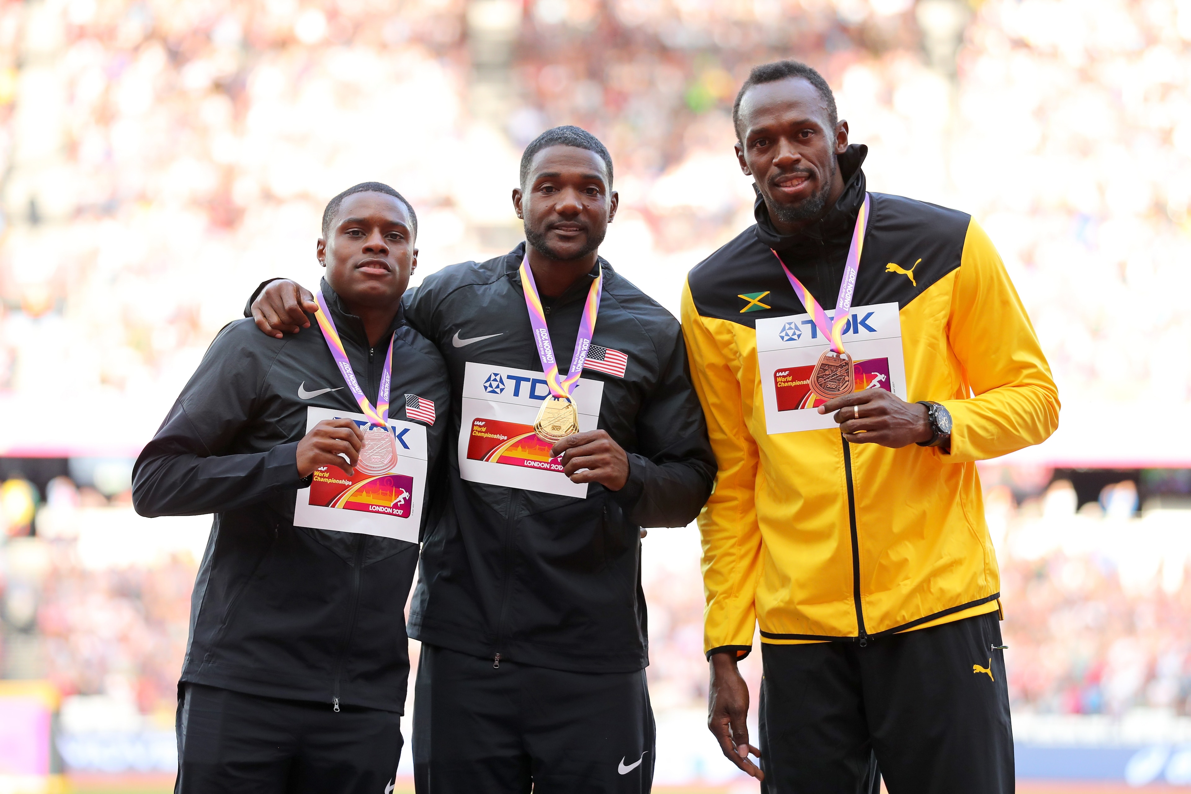 LONDON, ENGLAND - AUGUST 06: (L-R) Christian Coleman of the United States, silver, Justin Gatlin of the United States, gold, and Usain Bolt of Jamaica, broze pose with their medals for the Men's 100 metres during day three of the 16th IAAF World Athletic LONDON, ENGLAND - AUGUST 06: (L-R) Christian Coleman of the United States, silver, Justin Gatlin of the United States, gold, and Usain Bolt of Jamaica, broze pose with their medals for the Men's 100 metres during day three of the 16th IAAF World Athletic