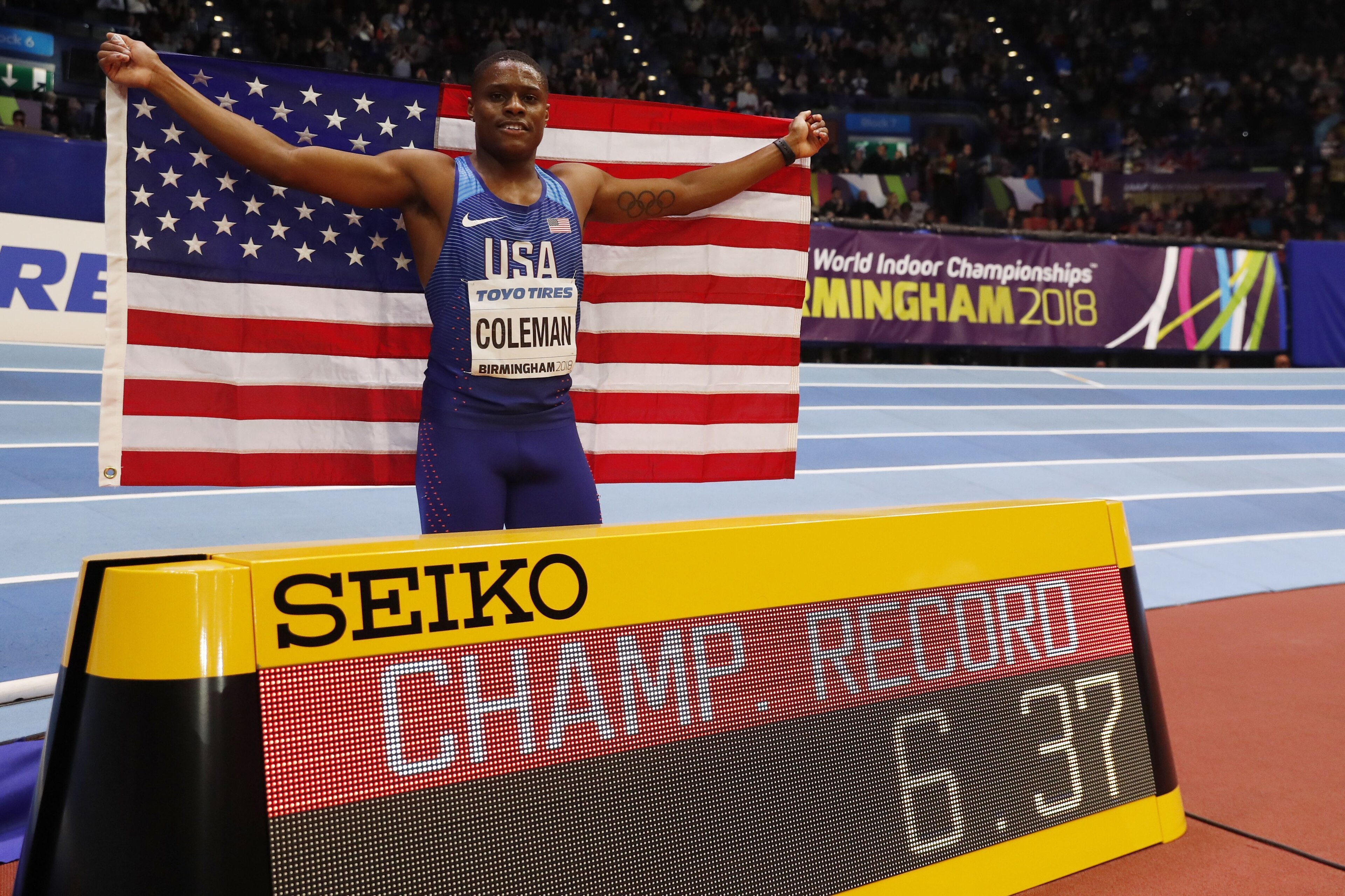 US athlete Christian Coleman celebrates winning the men's 60m final at the 2018 IAAF World Indoor Athletics Championships at the Arena in Birmingham on March 3, 2018. / AFP PHOTO / Adrian DENNIS (Photo credit should read ADRIAN DENNIS/AFP/Getty Ima US athlete Christian Coleman celebrates winning the men's 60m final at the 2018 IAAF World Indoor Athletics Championships at the Arena in Birmingham on March 3, 2018. / AFP PHOTO / Adrian DENNIS (Photo credit should read ADRIAN DENNIS/AFP/Getty Ima