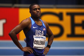 US athlete Christian Coleman wins the men's 60m semi-final at the 2018 IAAF World Indoor Athletics Championships at the Arena in Birmingham on March 3, 2018. / AFP PHOTO / Adrian DENNIS        (Photo credit should read ADRIAN DENNIS/AFP/Getty Images)
