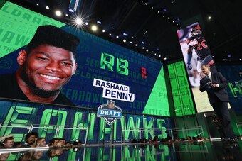 ARLINGTON, TX - APRIL 26:  A video board displays an image of Rashaad Penny of San Diego State after he was picked #27 overall by the Seattle Seahawks during the first round of the 2018 NFL Draft at AT&T Stadium on April 26, 2018 in Arlington, Texas.  (Ph