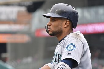 DETROIT, MI - MAY 12:  Robinson Cano #22 of the Seattle Mariners looks on while waiting to bat during the game against the Detroit Tigers at Comerica Park on May 12, 2018 in Detroit, Michigan. The Tigers defeated the Mariners 4-3.  (Photo by Mark Cunningh