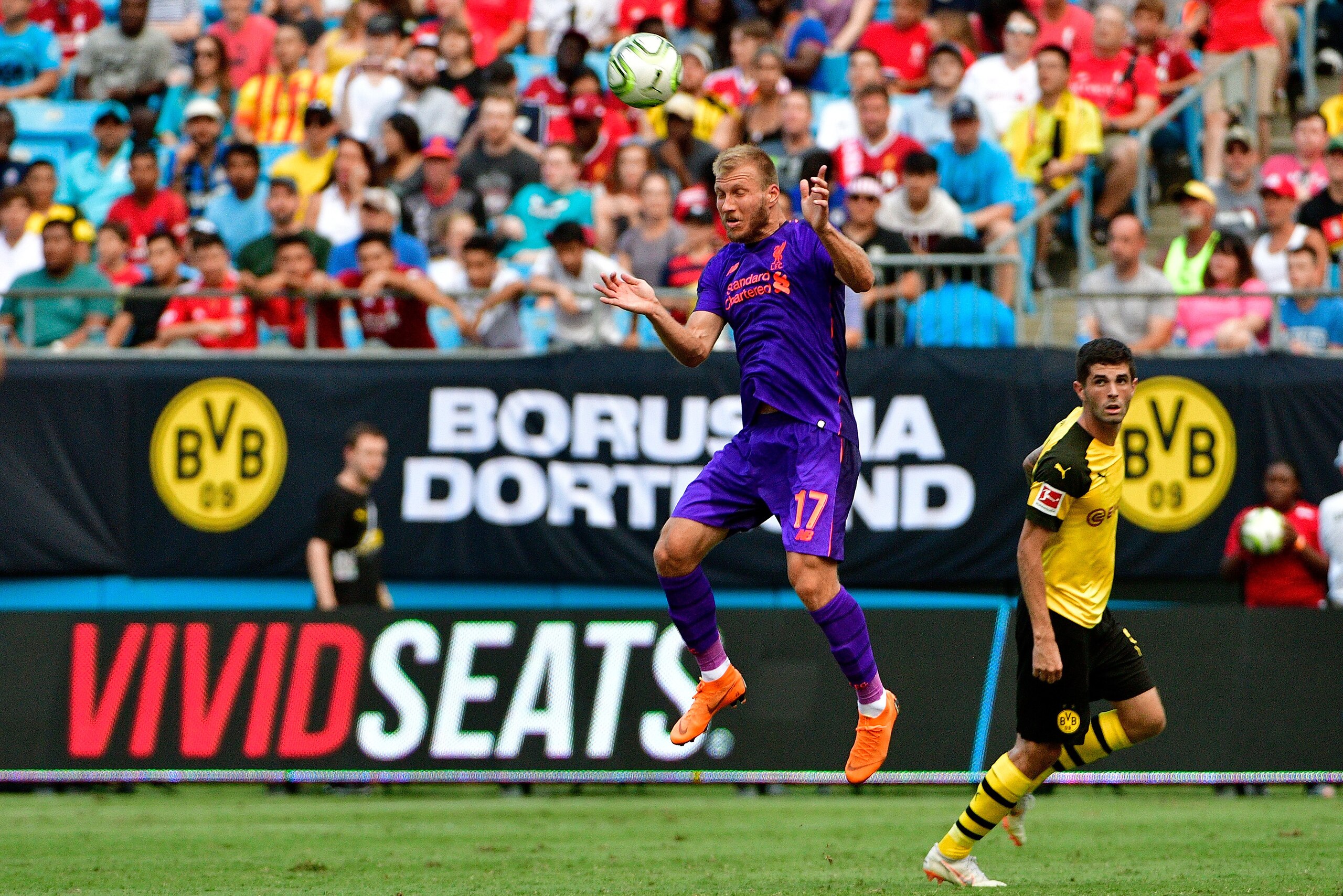 CHARLOTTE, NC - JULY 22:  Ragnar Klavan #17 of Liverpool heads the ball against Borussia Dortmund during an International Champions Cup game at Bank of America Stadium on July 22, 2018 in Charlotte, North Carolina.  (Photo by Grant Halverson/International