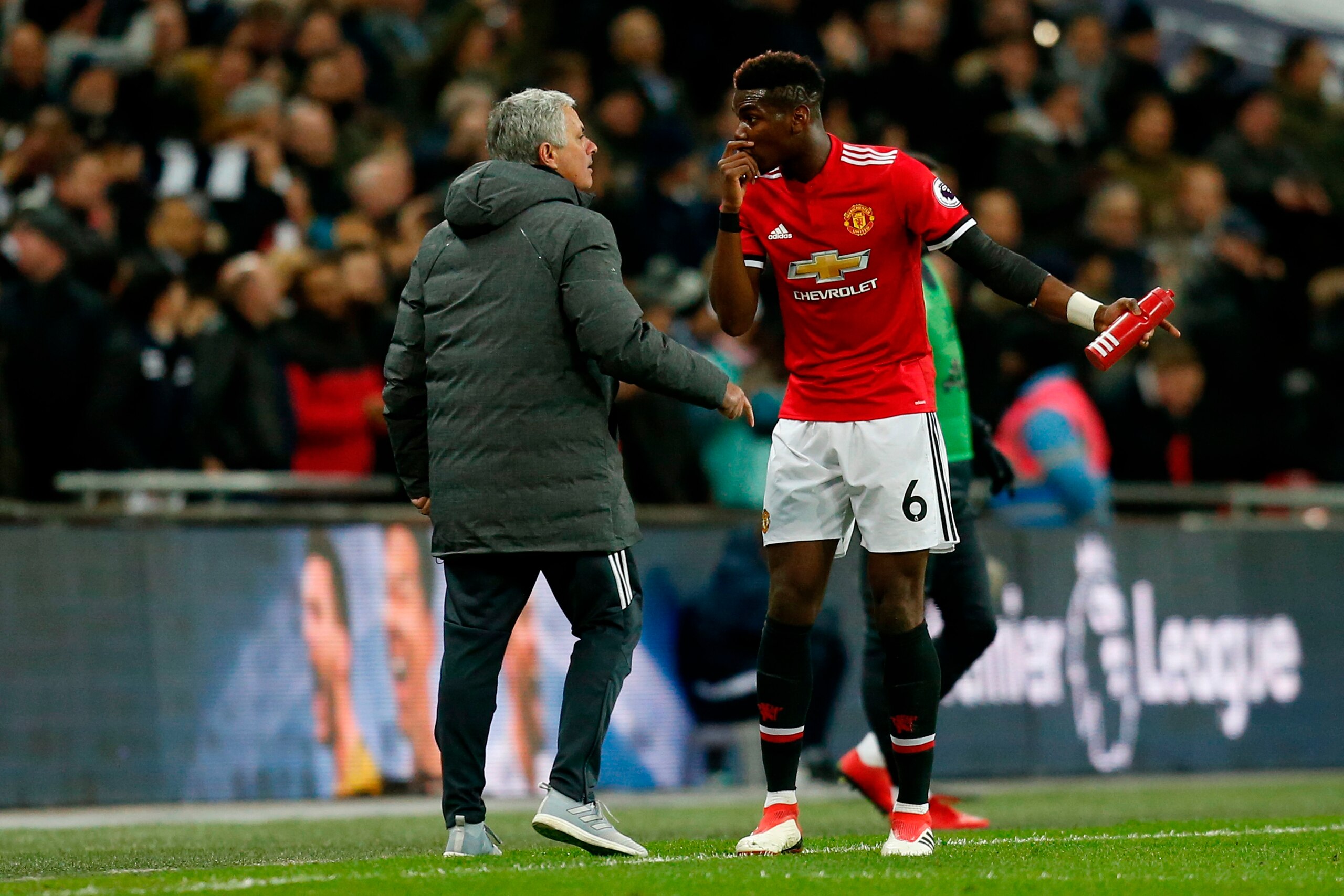 Manchester United's Portuguese manager Jose Mourinho (L) talks with Manchester United's French midfielder Paul Pogba (R) after the second Tottenham goal goes in during the English Premier League football match between Tottenham Hotspur and Manchester Unit Manchester United's Portuguese manager Jose Mourinho (L) talks with Manchester United's French midfielder Paul Pogba (R) after the second Tottenham goal goes in during the English Premier League football match between Tottenham Hotspur and Manchester Unit