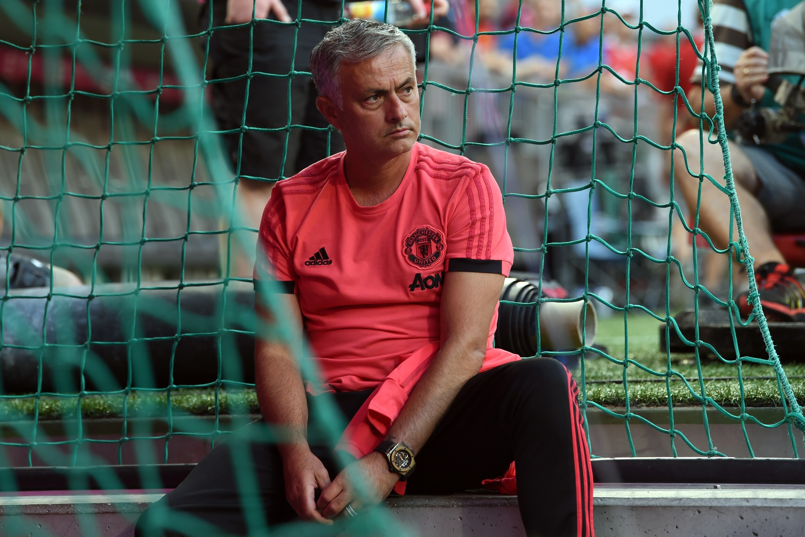 Manchester United's Portuguese manager Jose Mourinho waits for the warm up prior to the pre-season friendly football match between FC Bayern Munich and Manchester United at the Allianz Arena in Munich, southern Germany, on August 5, 2018. (Photo by Christ